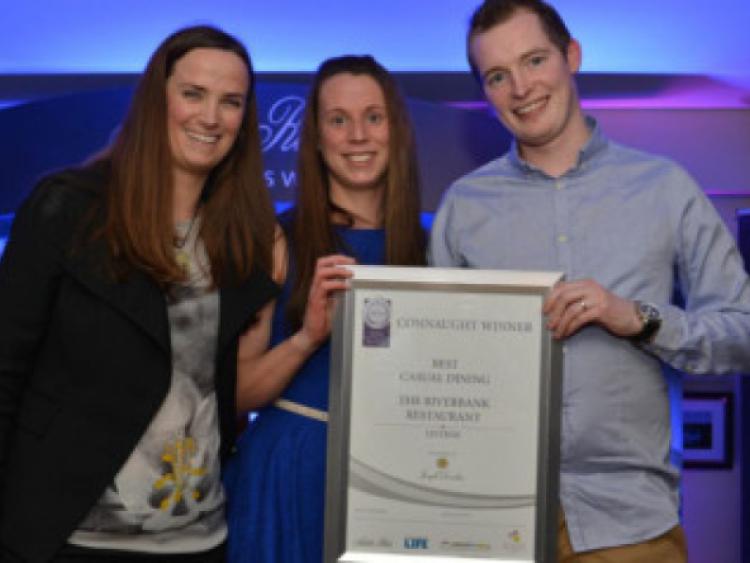 Maud Condomine of Gleesons incorporating Gibeys presents the award for Best Casual Dining  in Leitrim to Ruth & John Kelly of The Riverbank Restaurant, Dromahair.