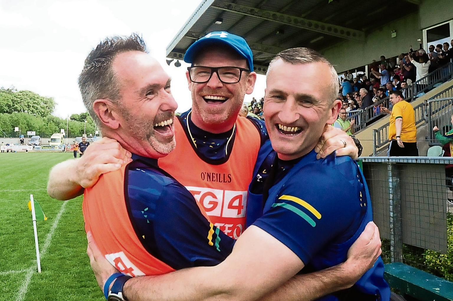 Leitrim manager Jonny Garrity (centre) celebrates with Dermot Feely and Michael Lee in Ballinamore Picture: Willie Donnellan