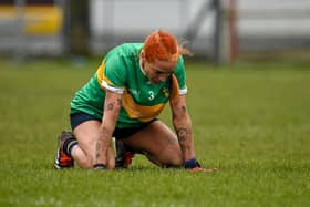 A disappointed Charlene Tyrell slumps to the ground after the final whistle in Woodmount Picture: Seb Daly Sportsfile