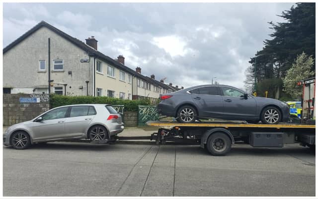 Two of the cars which were seized