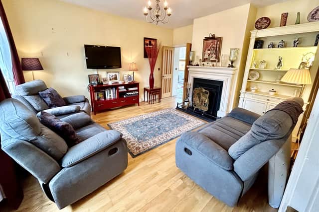 The accommodation comprises of entrance hall, living room with feature fireplace, bright & spacious kitchen/ dining area with range of wall and base units, dining room, bedroom one with ensuite, downstairs wc and bright warm sun room which benefits from stove and double doors leading out to patio area.