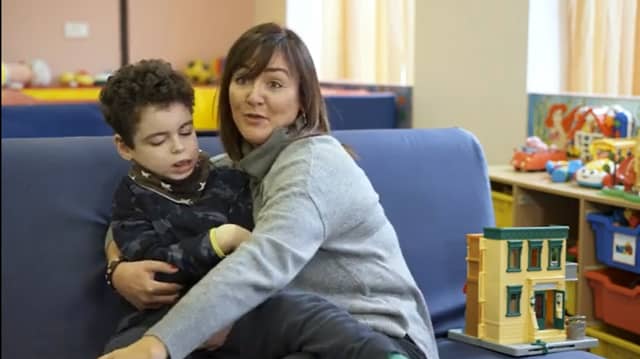 Susan McGloin with her son Conor who attends Childhood Days in Drumshanbo. Families say they would be lost without the service.