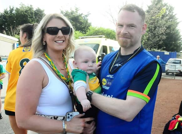 Leitrim manager Jonny Garrity pictured with his wife Kayleagh and four month old son Oisin after the Lidl LGFA Division 4 Final Picture: Willie Donnellan