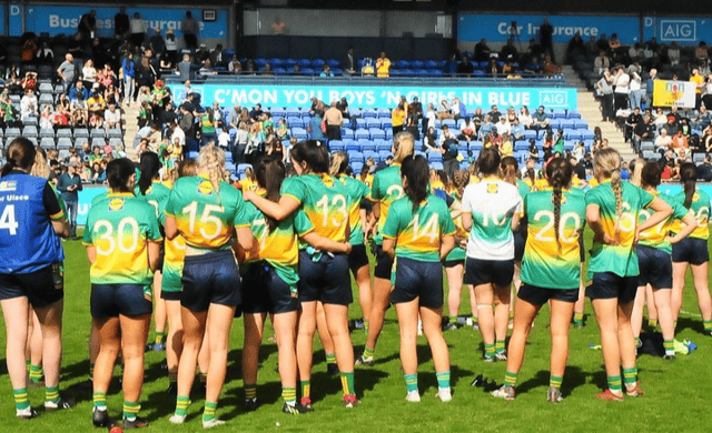 Leitrim players watch the presentation of the Lidl LGFA Division 4 trophy to Antrim Picture: Willie Donnellan