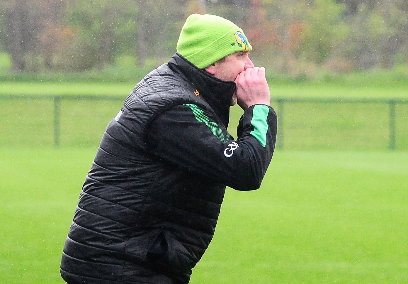 Leitrim manager Olcan Conway sends in instructions to his players against Cavan Picture: Willie Donnellan