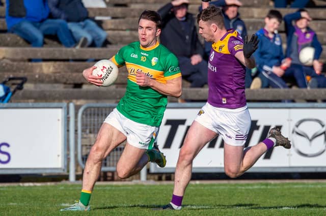Darragh Rooney goes past a Wexford defender Picture: Noel Reddy