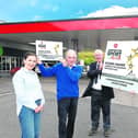 Club Treasurer, Breffni Hyland (centre left) and President, Gabriel Cox (centre right) with Texaco Dealer, Carmel Lunney, and Valero Area Sales Manager, Eugene Coyne.