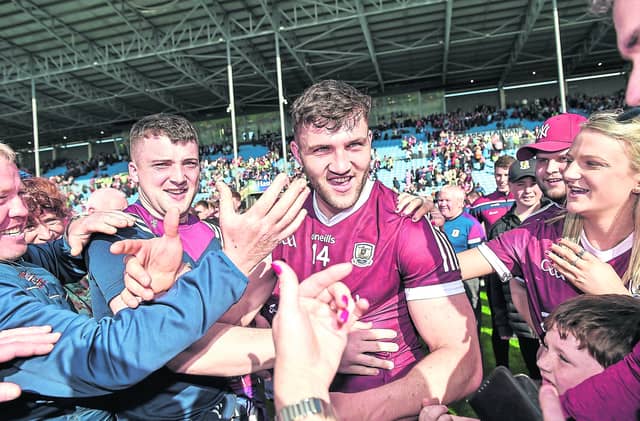 Damian Comer is congratulated by family and supporters after the game in the Connacht Senior Championship Quarter-Final match between Mayo and Galway at MacHale Park Picture: Ray Ryan Sportsfile
