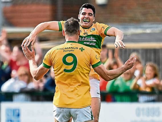 Emlyn Mulligan leaps into the arms of teammate Donal Wrynn after Leitrim's victory over London in the Connacht SFC first round clash in McGovern Emerald Park Picture: Sam Barnes Sportsfile