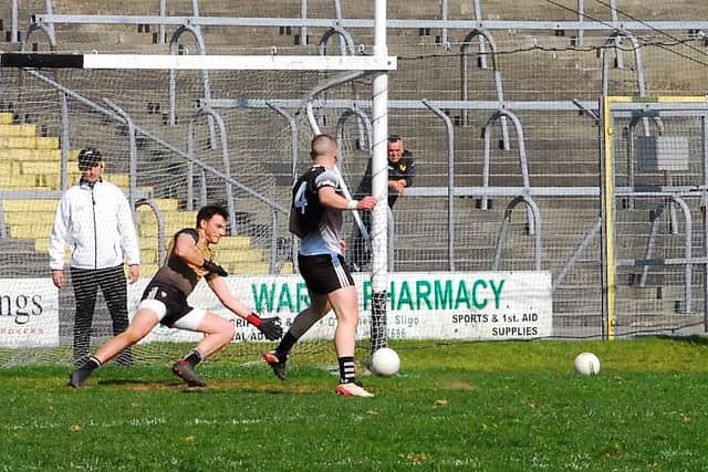 Sligo almost had a third goal when a fisted effort from Alan Reilly was cleared off the line by Conor Reynolds but Conan Marren tied the scores with a well worked point before the game took a massive twist when Keith Beirne was red carded. The action was up at the dressing room end where Alan Reilly's mark was whistled for taking too long just as he kicked the ball over the bar.