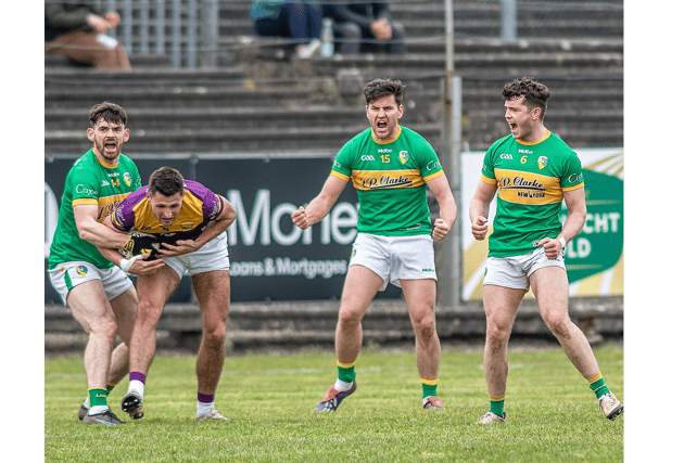 Leitrim players Mark Plunkett, Domhnaill Flynn and David Bruen celebrate a turnover against Wexford last Sunday Picture: Stefan Hoare