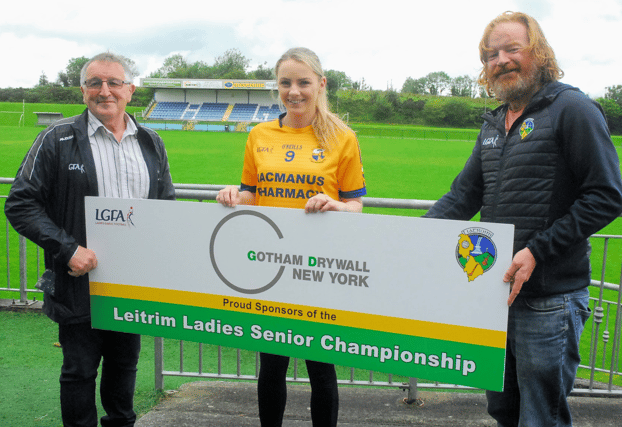 Melissa Hewitt of Glencar Manorhamilton pictured with Leitrim LGFA Chairman Aidan Heron and Secretary PJ Ward at the launch of the 2021 Gotham Dry Wall Club Championship Picture: Willie Donnellan