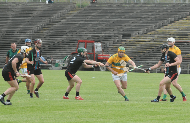 Leitrim's Cian Mallon is tackled by two Mayo players Picture: Willie Donnellan