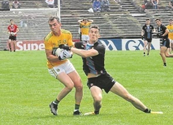 Leitrim's James Mitchell is tackled by Mayo's James McCormack during last Sunday's Connacht Senior Championship Semi-Final in Elvery's Mac Hale Park Picture: Willie Donnellan