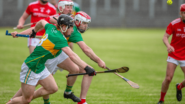 Two Leitrim players chase the sliothar during Sunday's Allianz NHL Division 3B clash against Louth Picture: Stefan Hoare
