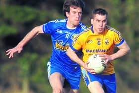 New Leitrim GAA Games Development Administrator Stephen McGurran is pictured in action for Melvin Gaels against Glencar/Manorhamilton's Paddy Maguire.