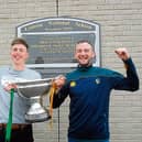 Champion 15 All-Stars Enda and Liam Moreton pictured with the Lory Meagher Cup on a visit to St Joseph's NS Leitrim Village last June Picture: Willie Donnellan