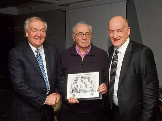 Mike Feeney & Eamonn Duignan present Columba Cryan with a photo to mark the 60th anniversary of Connacht's 1958 Railway Cup victory. Photo by Willie Donnellan