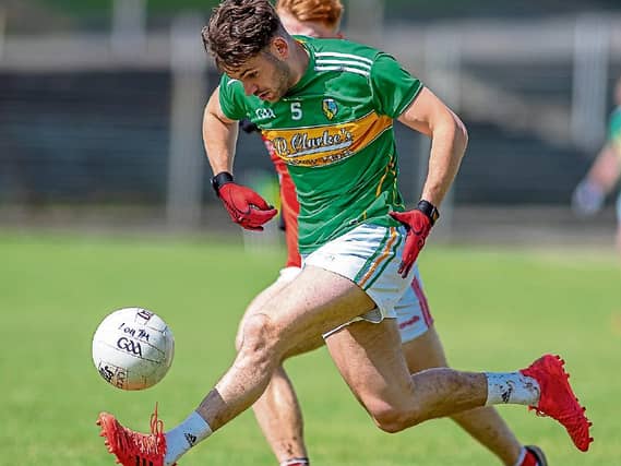 A flying Oisin Madden solos the ball against Louth last Sunday in Avant Money Pairc Sean Mac Diarmada Picture: Stefan Hoare