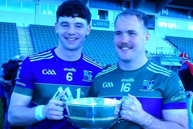 Donal Casey and his cousin Matthew Earley pictured with the Fenagh Cup after Leitrim Gaels victory over Ballinamore Sean O’Heslins in last year’s Connacht Gold Leitrim SFC Final Picture: Willie Donnellan