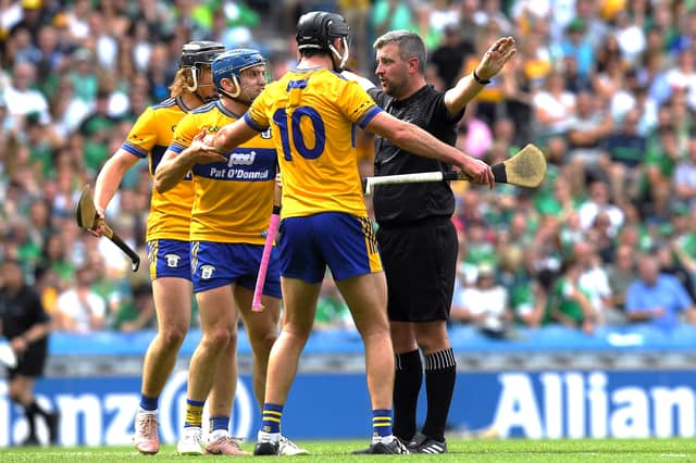 Clare players, from left, Shane O'Donnell and Cathal Malone react to a decision by referee Thomas Walsh during the GAA Hurling All-Ireland Senior Championship semi-final match between Clare and Limerick at Croke Park Picture: John Sheridan Sportsfile