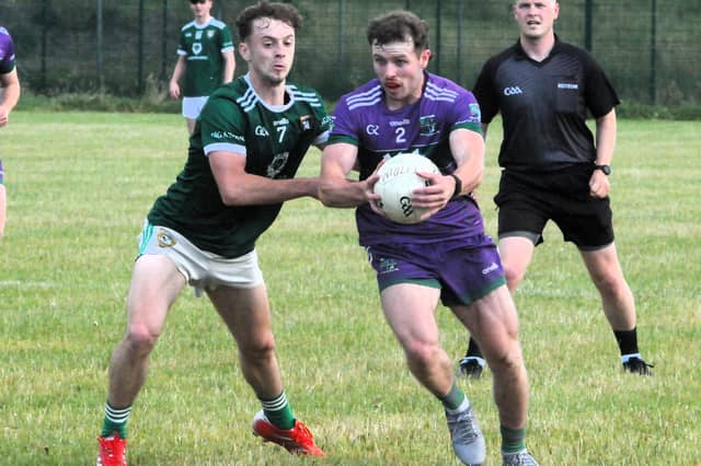 Mohill's Eoghan Duignan challenges Leitrim Gaels' Shane Finn for the ball Picture: Willie Donnellan