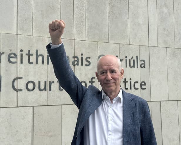 Osgur Breatnach raising a fist in the air