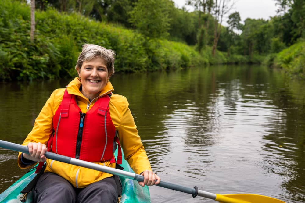Geographer Susan Hegarty kayaking on the Shannon Blueway in Drumshanbo.