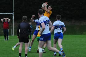 Shane Moran makes a catch at midfield that led to Ballinamore Sean O'Heslins' match winning free against St Mary's Kiltoghert Picture: Willie Donnellan