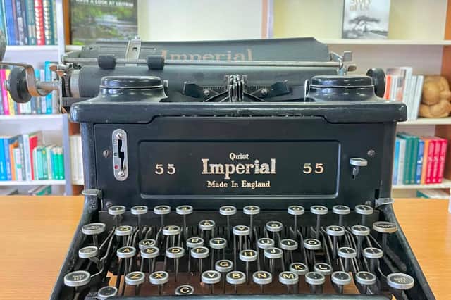   An old typewriter at The Reading Room offers a striking contrast to a future increasingly shaped by AI.  