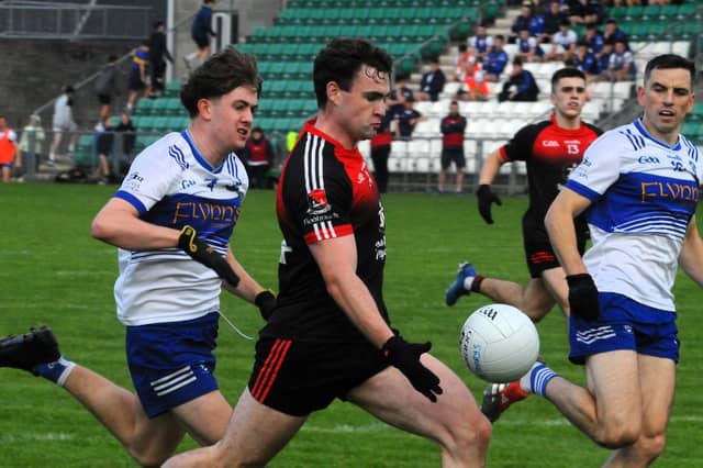 Fenagh St Caillins' Ryan O'Rourke charges through to score a first half point against St Mary's Kiltoghert in the Connacht Gold SFC Quarter Final Picture: Willie Donnellan