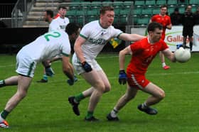 Dromahair's James Clancy gets away from Aughavas' Shane O'Brien and Paul Bohan during Sunday's Smith Monumentals IFC Semi-Final in Heartland Credit Union Pairc Sean Mac Diarmada Picture: Willie Donnellan
