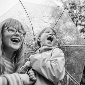 Leitrim children Amelia Kavanagh and Laoise Domican are pictured reflecting the theme of water, which is the theme of the festival.