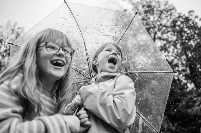 Leitrim children Amelia Kavanagh and Laoise Domican are pictured reflecting the theme of water, which is the theme of the festival.