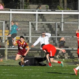 Darren Cox turns in celebration after scoring his team's second goal against St Patrick's Dromahair Picture: Willie Donnellan