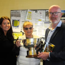 Leitrim GAA County Board officials Aoife Keenan, Attracta O’Reilly and Declan Bohan pictured with the Fenagh Cup - who will bring it home next Saturday Picture: Willie Donnellan