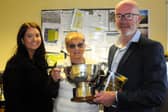 Leitrim GAA County Board officials Aoife Keenan, Attracta O’Reilly and Declan Bohan pictured with the Fenagh Cup - who will bring it home next Saturday Picture: Willie Donnellan