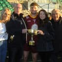 Annaduff captain Eoin Gill celebrates with family and the Frank Reynolds Cup Picture: Willie Donnellan