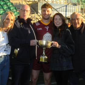 Annaduff captain Eoin Gill celebrates with family and the Frank Reynolds Cup Picture: Willie Donnellan