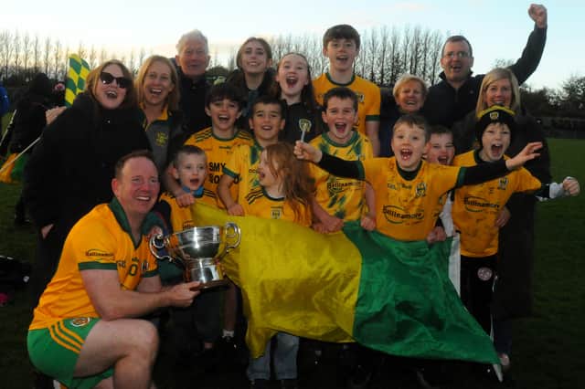 Liam Ferguson celebrates with the Fenagh Cup and Ballinamore Sean O'Heslins supporters Picture: Willie Donnellan