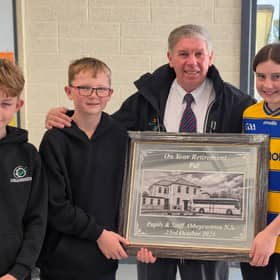  Senior pupils Lauren, Aaron and Jonah present retiring Bus Éireann school bus driver Pat McGarry with an engraved mirror to mark his 19 years of service on the Elphin route.  