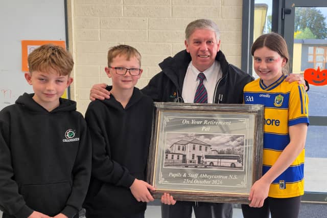 Senior pupils Lauren, Aaron and Jonah present retiring Bus Éireann school bus driver Pat McGarry with an engraved mirror to mark his 19 years of service on the Elphin route.