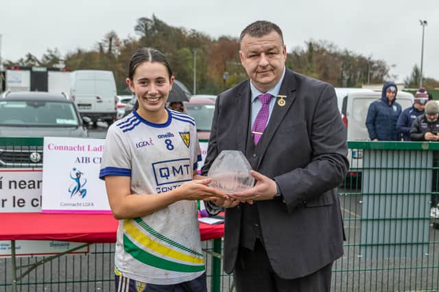 Dearbhla Gunn is presented with the Player of the Match award by Connacht LGFA President Keith Gilroy Picture: Stefan Hoare