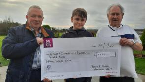 Bernard Murray Walk sees cheques presented to two charities
