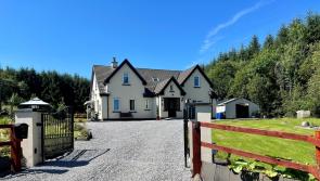 Home  in Leitrim offers landscaped gardens and elevated views