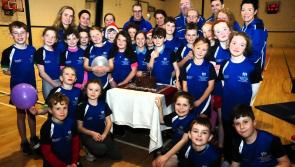 Carrick AC celebrate 50th anniversary with presentation of t-shirts to club members