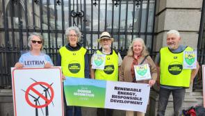 Leitrim groups protest outside Dáil Éireann re: outdated windfarm guidelines