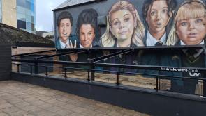 Controversial awning blocking Derry Girls mural reinstalled days after removal