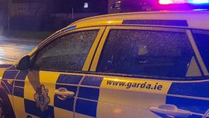 Man arrested after pedestrian is killed in hit and run on busy road 