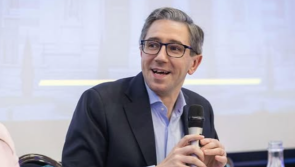 'Unacceptable': Mental health charity condemns online threats  targeting Simon Harris